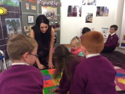 Muinteoir Aine gets stuck in with the BeeBots!